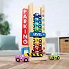 A Melissa & Doug Stack & Count Wooden Parking Garage with 10 Cars toy.