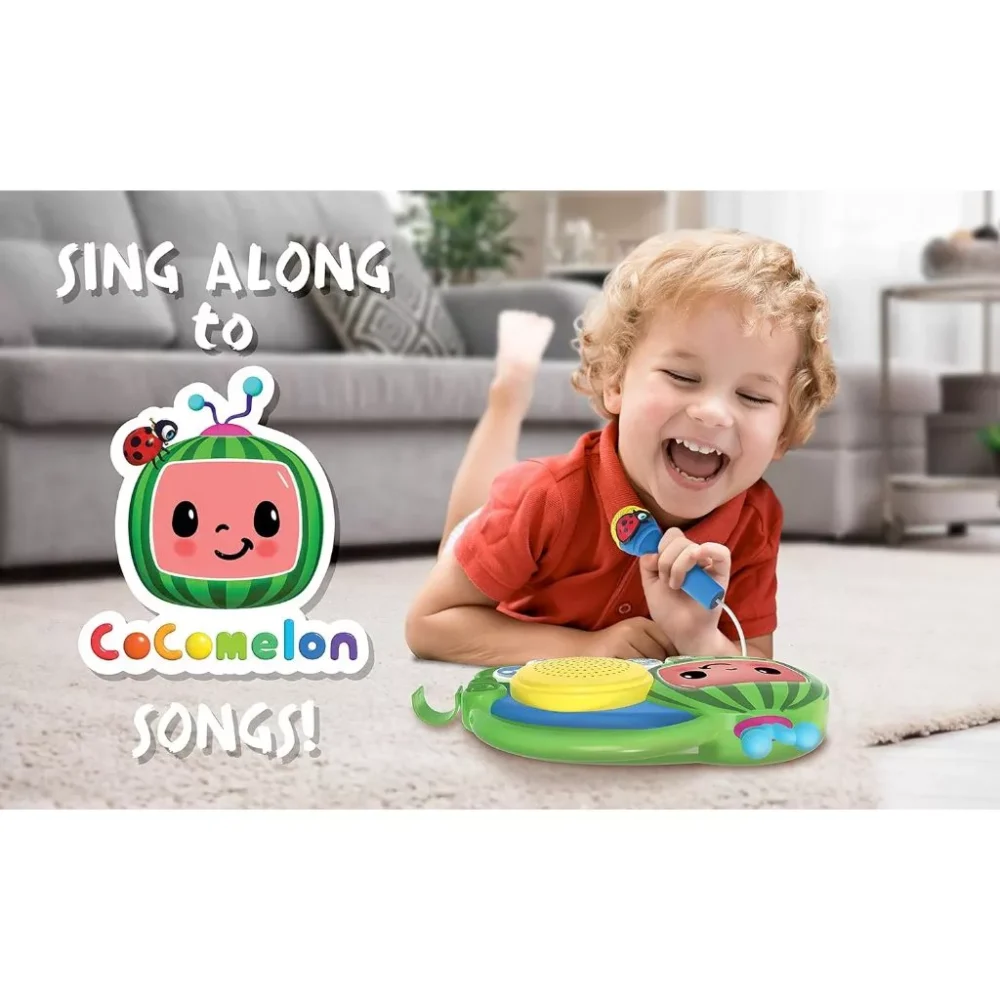 A joyful child in a red shirt plays with the CoComelon Toy My First Sing Along Boombox, featuring a working microphone and drum. The text "Sing along to CoComelon songs!" appears beside the CoComelon character logo.