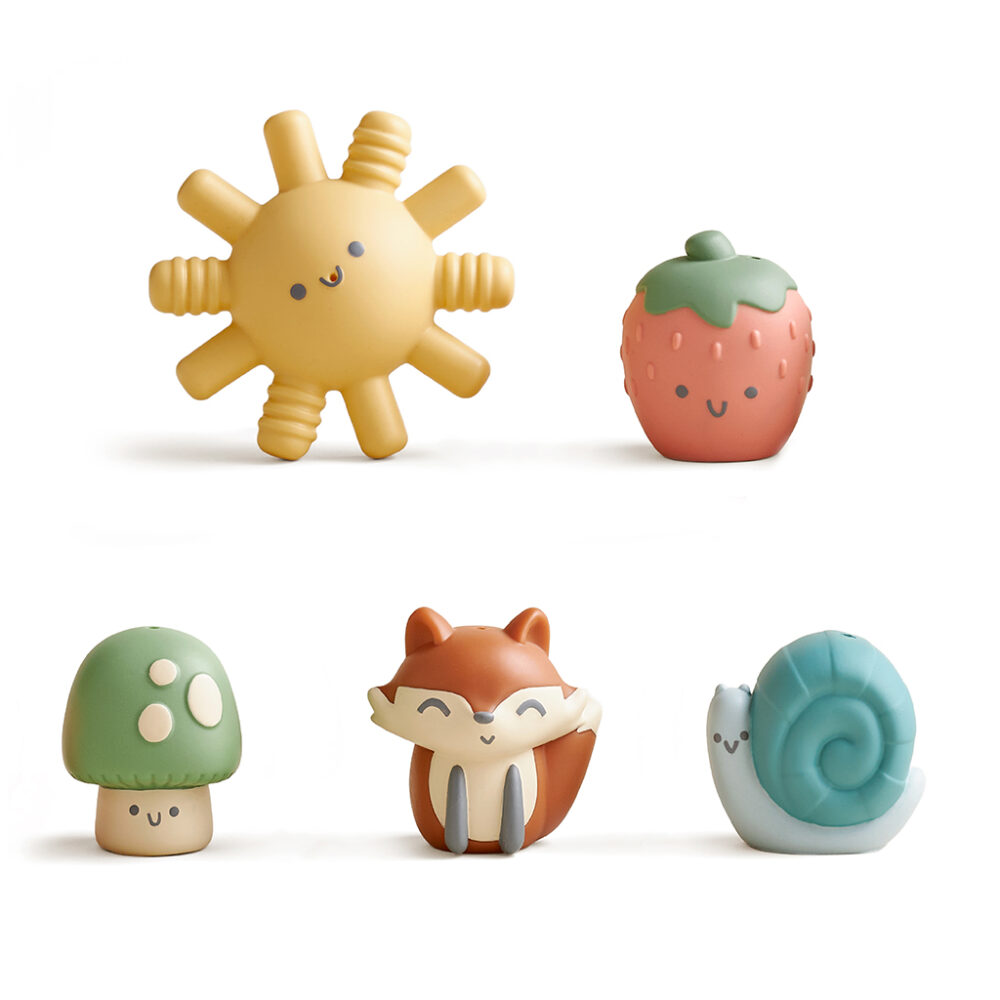 The "Itzy Ritzy Finger Puppets Bath Toys" set includes adorable cartoon-like toys in various shapes: a sun, a strawberry, a mushroom, a fox, and a snail. Each toy features smiling faces and comes in pastel colors.