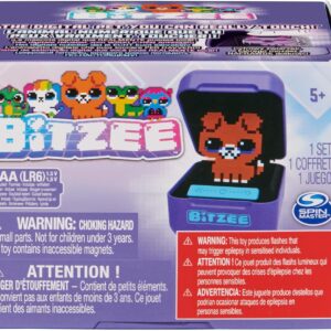 A Spin Master Bitzee Interactive Toy Digital Pet package showing a cute pixelated bear character on the LCD screen, suitable for ages 5+. Includes choking hazard warning and requires 3 AA batteries.