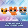 Pixel art graphics of a character growing from baby to adult to a superhero, set against a geometric background with the caption "Grows from baby to adult to Spin Master Bitzee Interactive Toy Digital Pet" below.