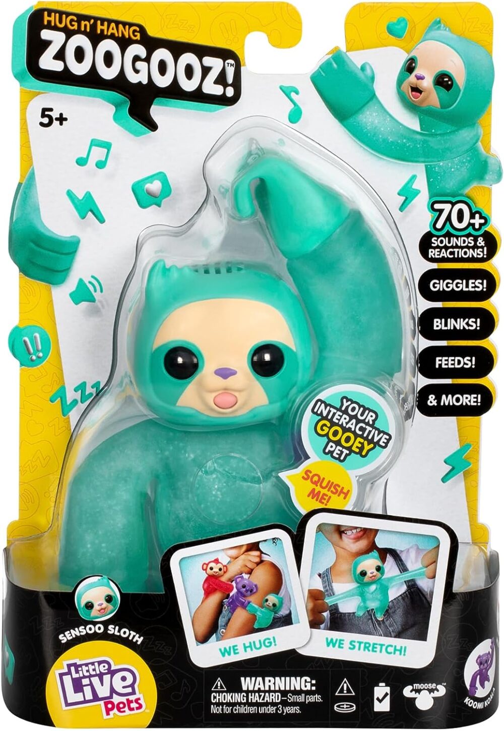 A teal-colored interactive toy sloth named "Gropey" with limbs that can hug and stretch, in its packaging. The product promises over 70 sounds and reactions and is intended for ages 5 and up.