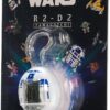 Packaging of a Tamagotchi Nano x Star Wars - R2-D2 Hologram by Bandai, suitable for ages 8 and up. The device is displayed with pixel art of R2-D2 and other Star Wars characters in the background.