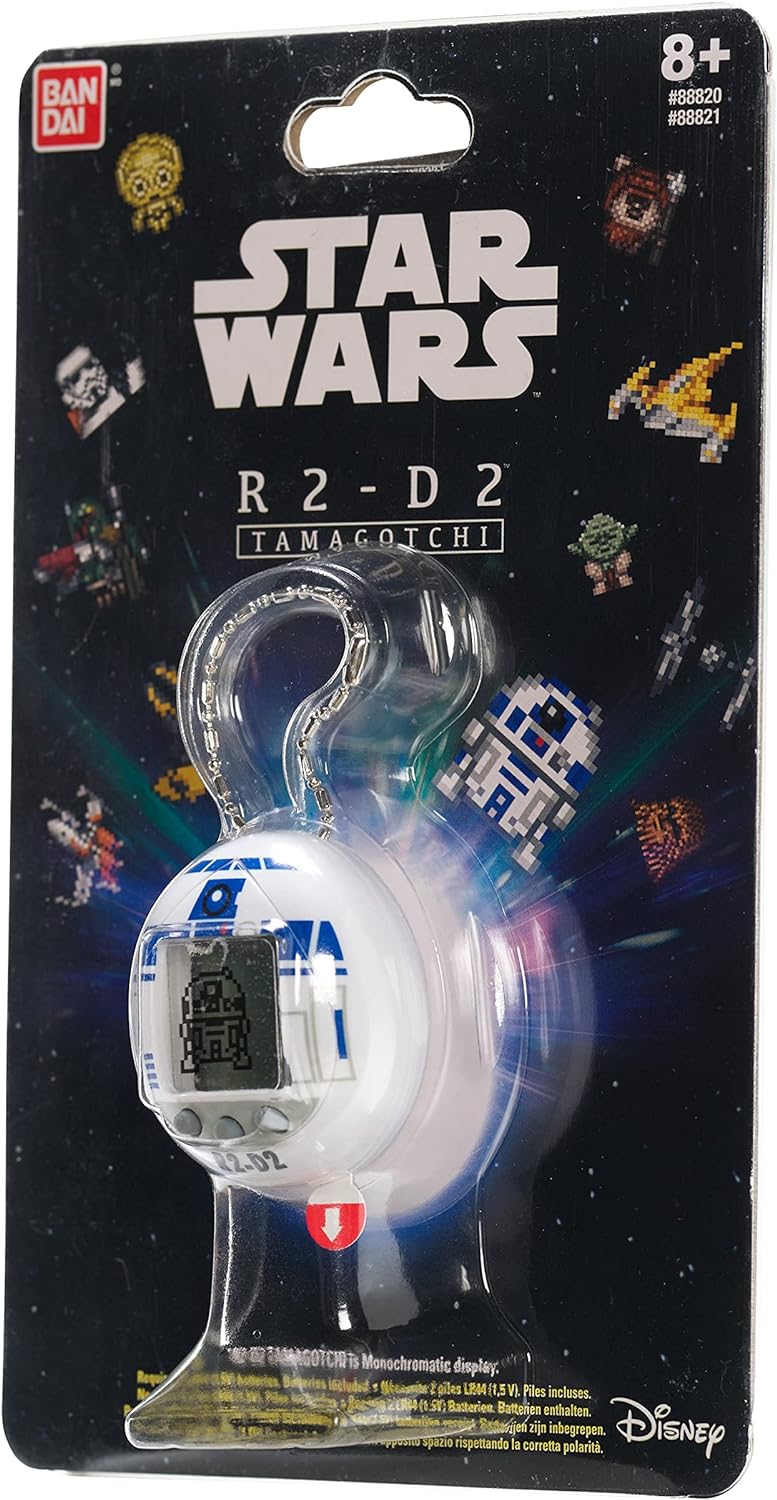 Packaging of a Tamagotchi Nano x Star Wars - R2-D2 Hologram by Bandai, suitable for ages 8 and up. The device is displayed with pixel art of R2-D2 and other Star Wars characters in the background.