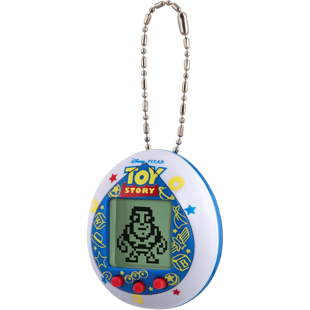 Tamagotchi Nano x Toy Story - Friends is a Toy Story-themed digital pet keychain featuring an egg-shaped screen that displays a pixelated character and is attached to a metal ball chain.