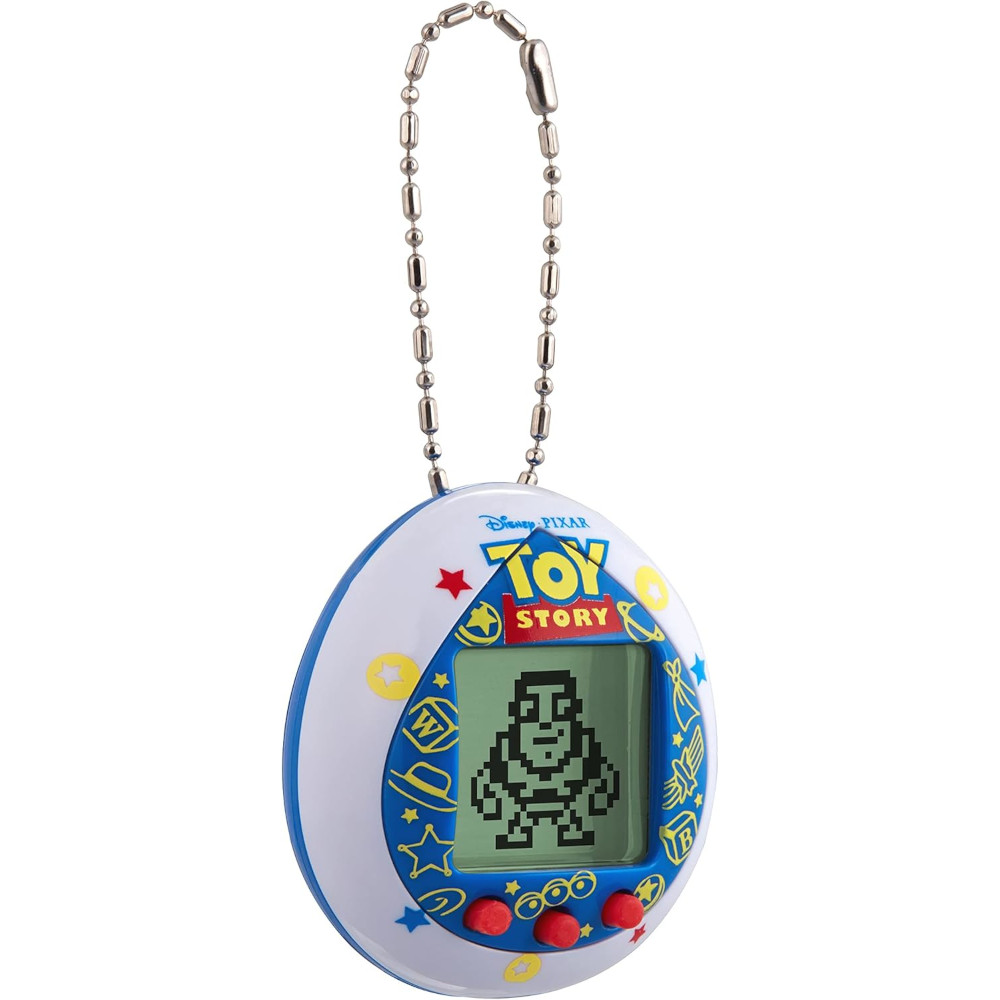 Introducing the Tamagotchi Nano x Toy Story - Friends, a handheld digital pet toy with a captivating "Toy Story" theme, showcasing pixelated characters on its screen and equipped with a convenient keychain attachment.