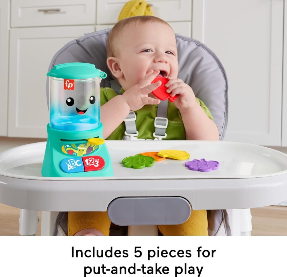 A baby sits in a high chair, playing with a colorful toy set. The Fisher-Price Laugh & Learn Baby & Toddler Toy Counting & Colors features a smiling container and various shapes. Text at the bottom reads, "Includes 5 pieces for put-and-take play.”