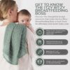 A woman holding a baby is using the Breastfeeding Boss, A Multitasking Must-Have for Nursing, Swaddling & More in green. It is made of soft cotton and features multi-functional use, a spacious size, and a stylish design for discreet feeding.