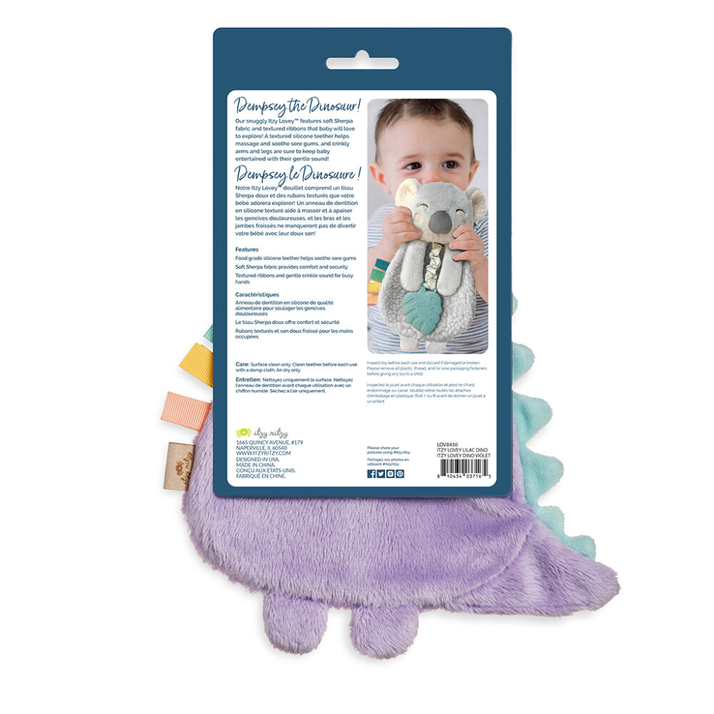 A product package displaying a photograph of a child holding a stuffed dinosaur toy. The package lists features, care instructions, and contact information of the manufacturer.