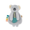 A soft, grey koala plush toy with a round body, multicolored ribbons on one side, and a textured blue teether attached to its front.