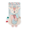 A plush toy with a fox design, holding a blue teething ring, adorned with colorful tags and a striped scarf, in packaging labeled "Itzy Lovey.