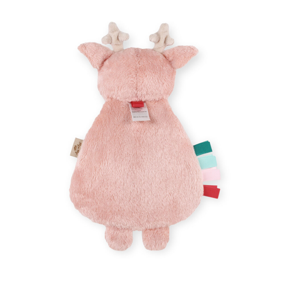 A plush toy resembling a deer, viewed from the back, with pink fur, small beige antlers, and colorful tags attached.